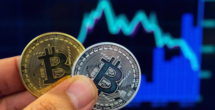 "قفزة قياسية": البيتكوين يتخطى 71 ألف دولار !