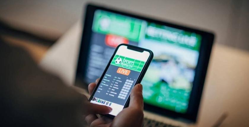 المراهنة الرياضية: كيف وسعت 1XBET مخالبها في المغرب