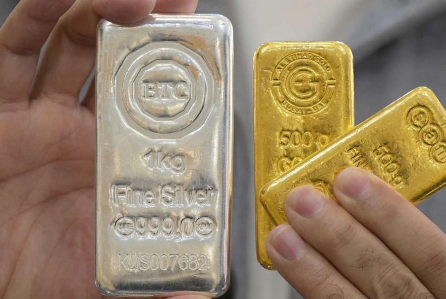 Gold and silver tumble as dollar surges on Iran war and inflation fears