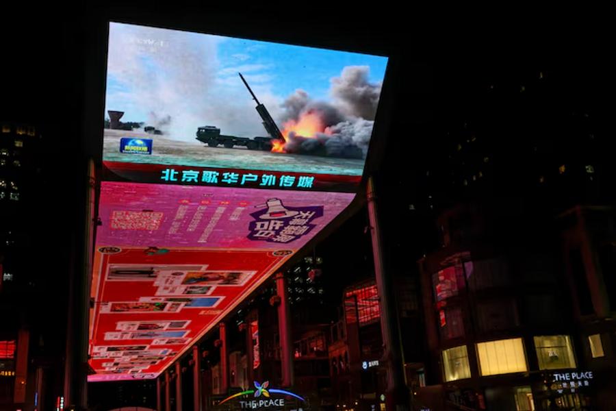 Taiwan reports rising military pressure as China promotes peace dialogue