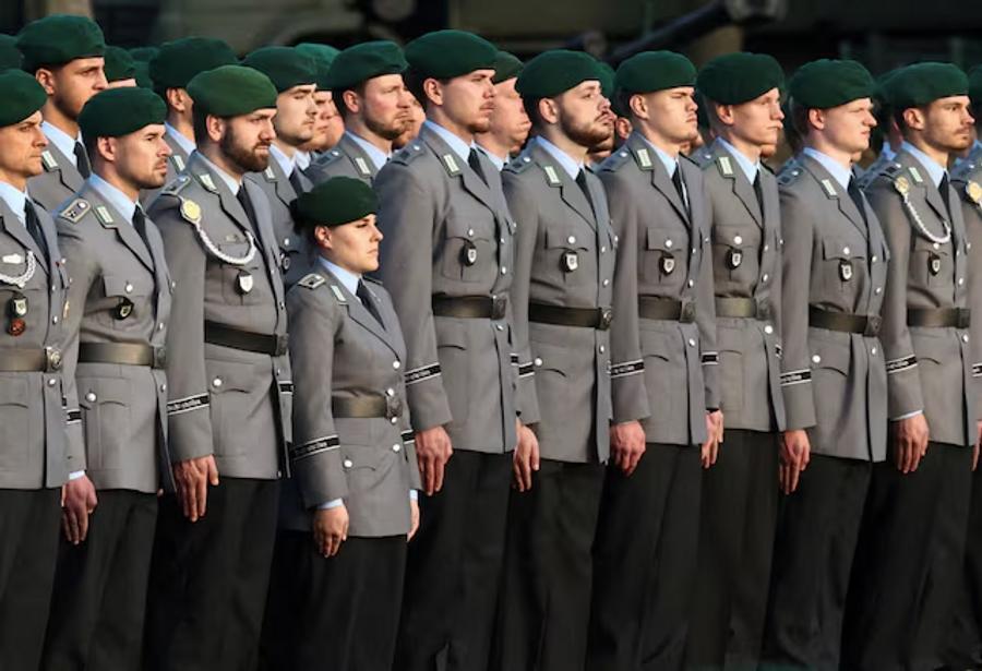 Germany moves to clarify rules for fighting-age men traveling abroad