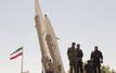 Iran unveils a new ballistic missile as nuclear talks with the United States begin