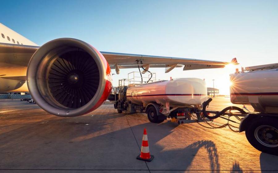 Airlines raise fares and cut flights as jet fuel prices surge