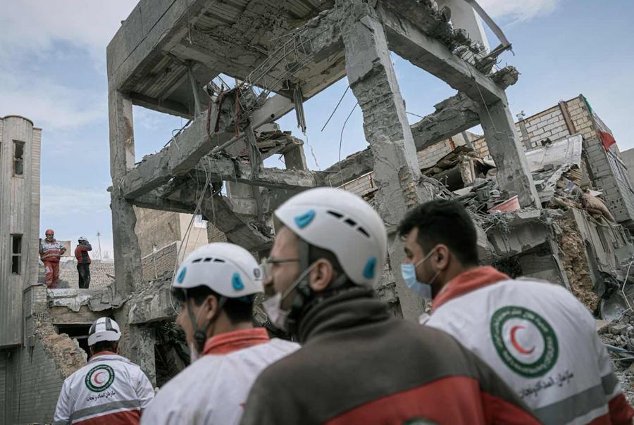 US-Israel strikes hit Iranian residential areas, killing 18 in Qom