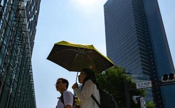 Japan fall tragedy leaves pedestrian dead after man survives 12th-floor plunge