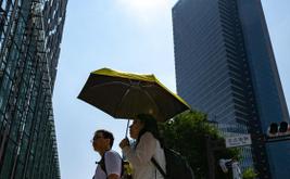 Japan fall tragedy leaves pedestrian dead after man survives 12th-floor plunge