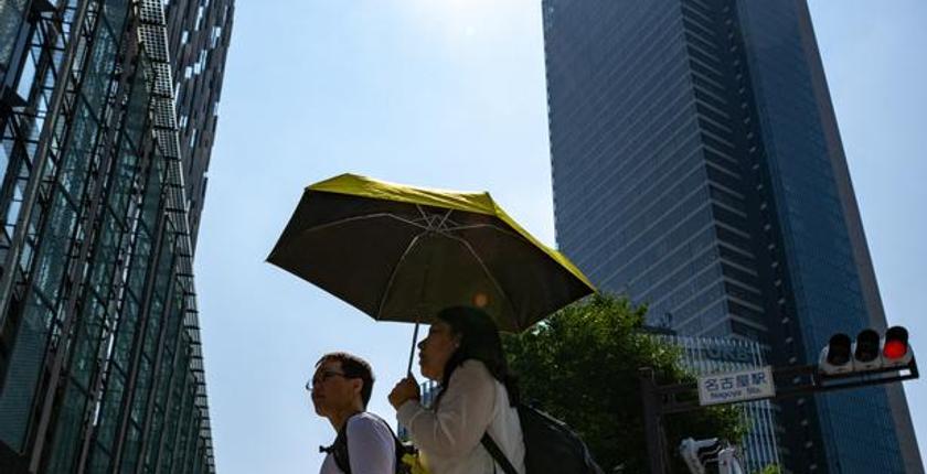 Japan fall tragedy leaves pedestrian dead after man survives 12th-floor plunge