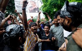 India youth protesters end demonstration after government talks and education minister's resignation
