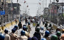 India suspends police officer after rifle fired during student protest crackdown