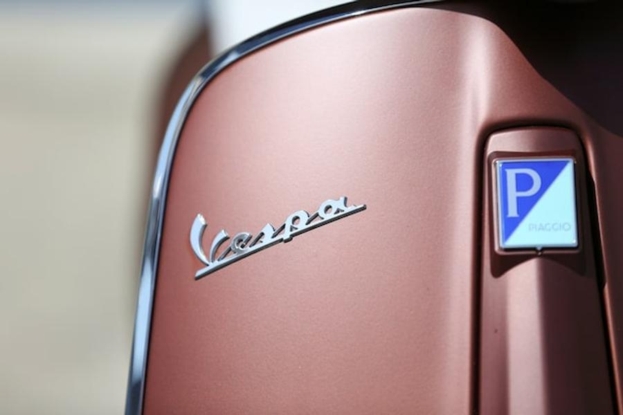 Vespa maker Piaggio raises dividend outlook after strong second-quarter performance