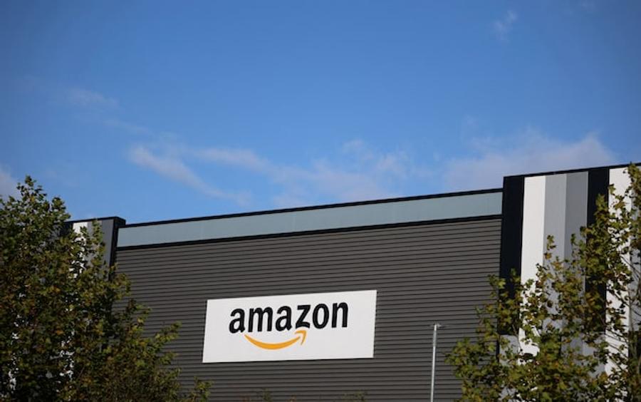 Amazon rally lifts Nasdaq futures despite Apple sell-off on supply concerns