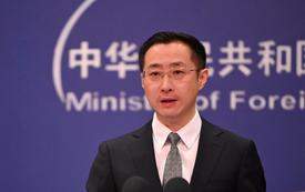 China opposes unilateral sanctions and vows to protect its companies