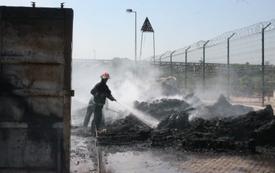 Beirut port container fire brought under control after emergency response