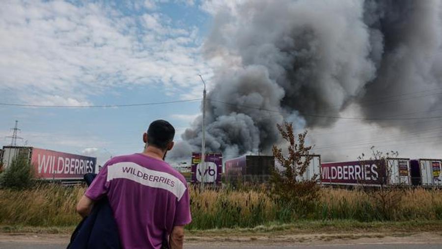 Russia: Two Dead After Drone Crash, Wildberries Site Devastated by Fire