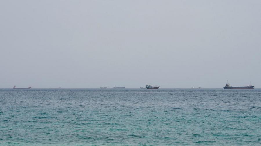 Hormuz Strait: A Ship Hit by a Projectile, Fire Contained Onboard
