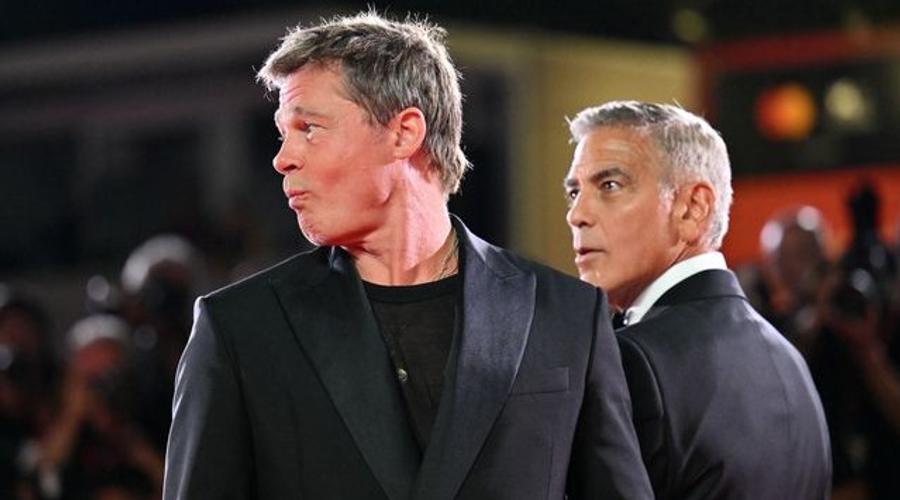 Brad Pitt taquine George Clooney à la Mostra de Venise
