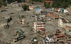 Nepal police races to recover gold and cash-filled bank vaults swept away by floods