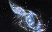 Nasa unveils stunning images of colliding galaxies and cosmic nurseries