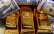 Gold edges higher as dollar weakens on Iran talks hopes