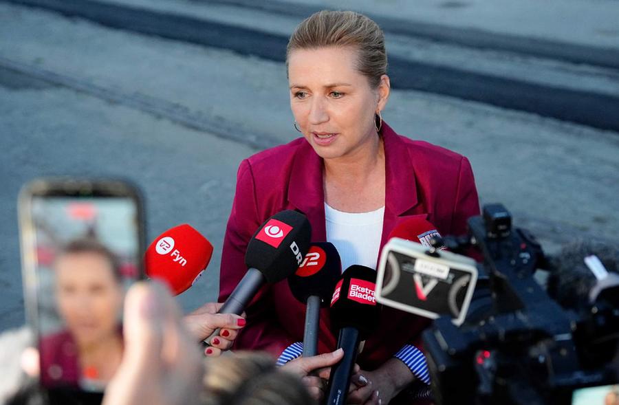 Frederiksen secures third term with new Danish coalition