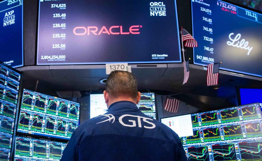 Global markets slide as investors retreat from AI-driven stocks