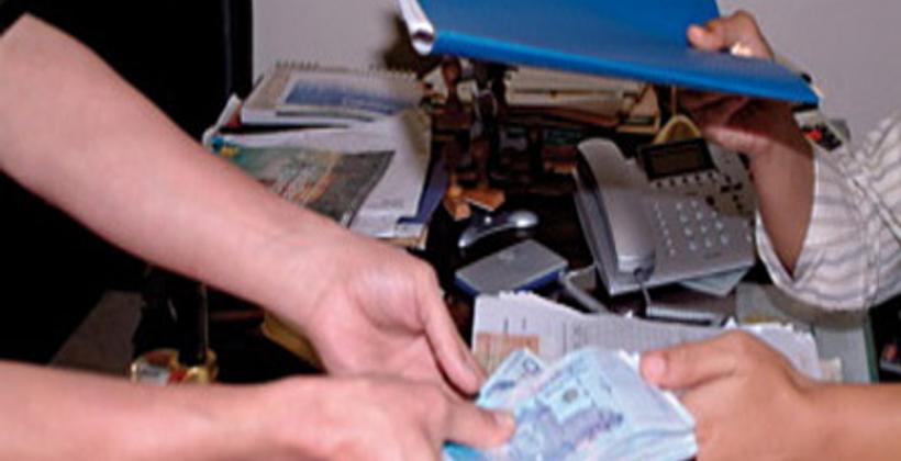 رشوة بالملايين توقع مسؤولا رفيع المستوى بمراكش في قبضة الأمن..