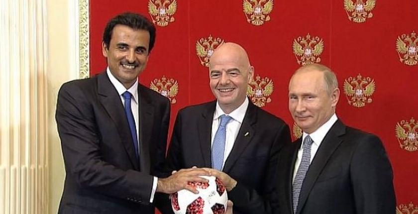 بوتين يسلم تميم شارة كأس العالم 2022